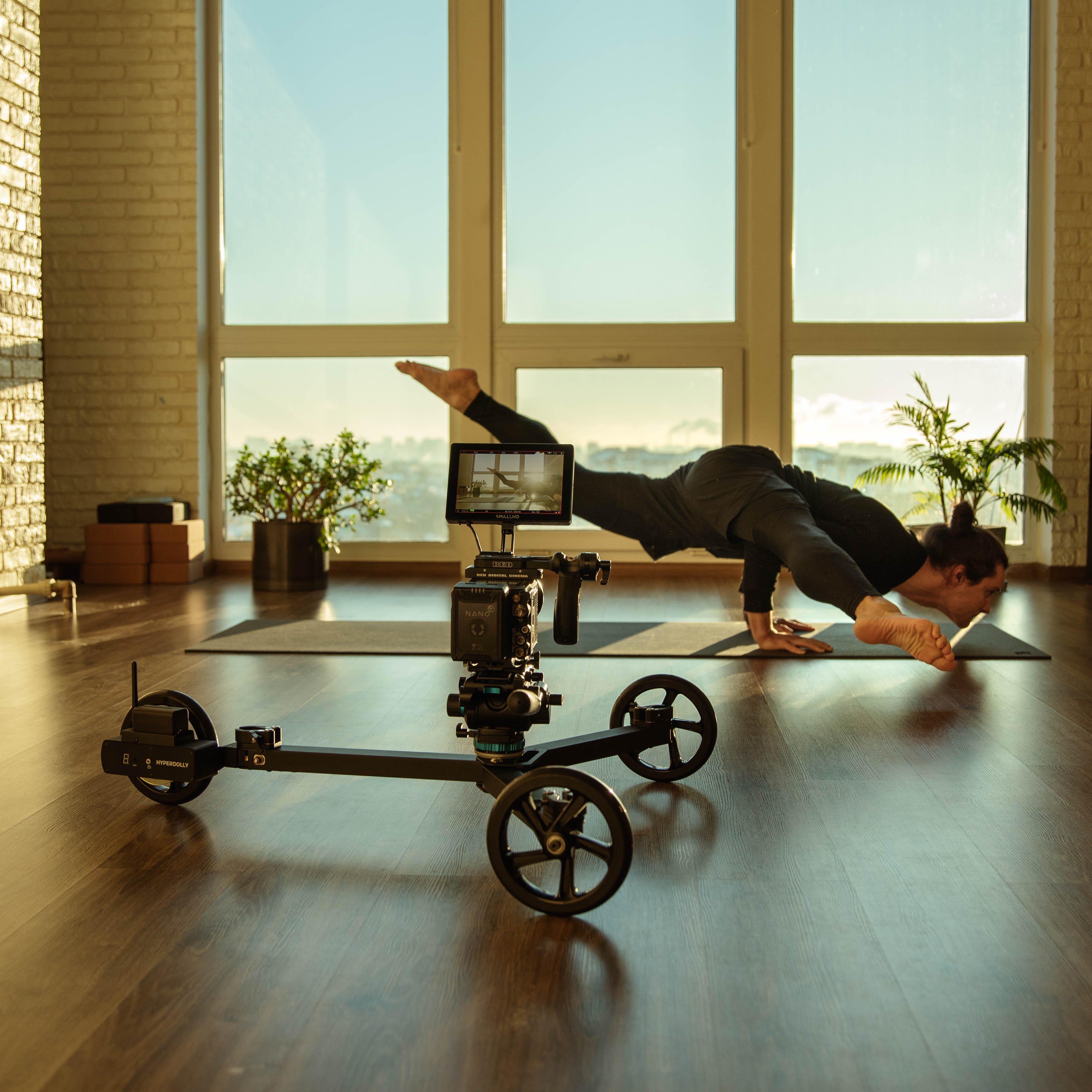 Hyperdolly HY-01 motorized camera dolly with RED Komodo-X filming yoga low angle tracking shot